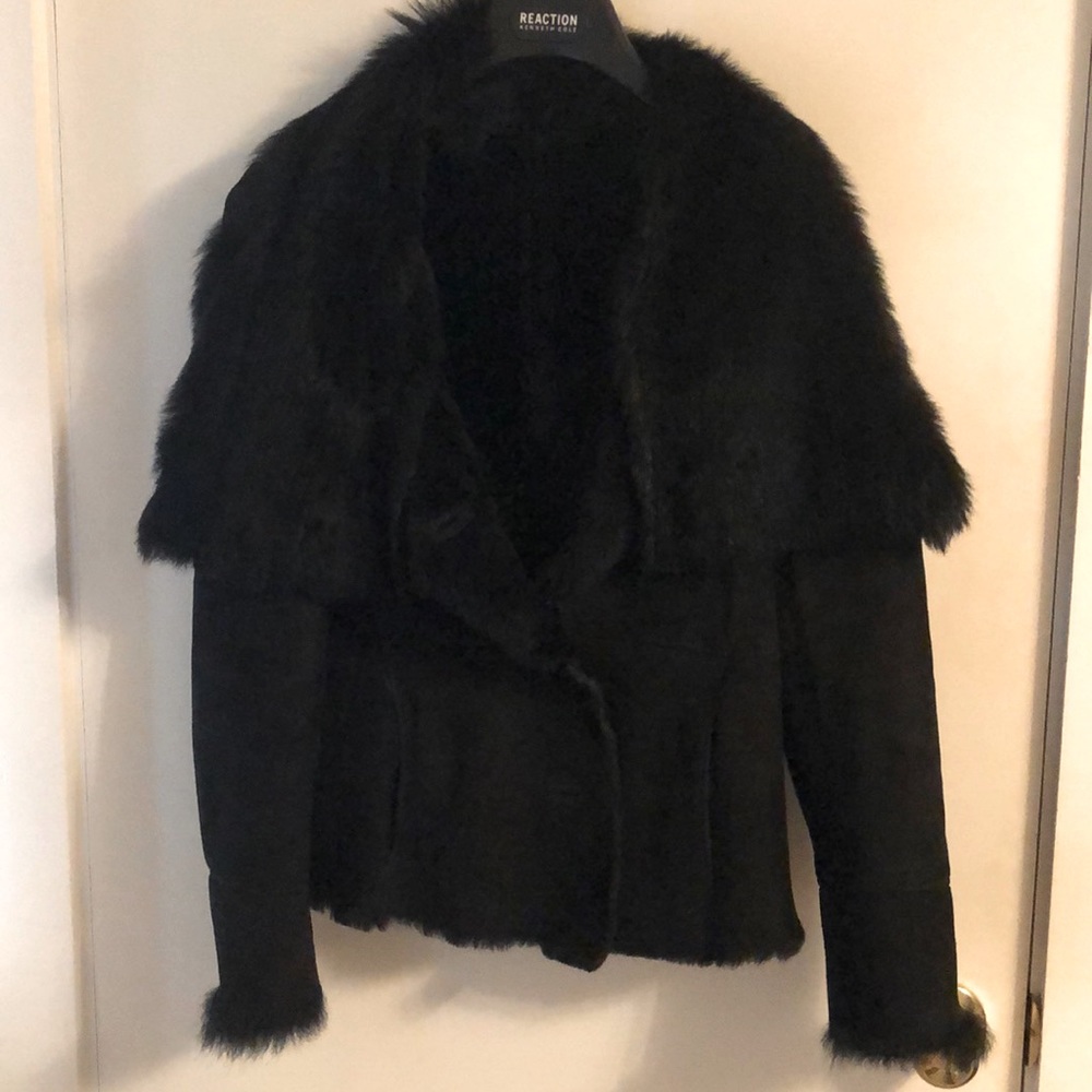 Karl Donoghue size 6 black genuine lamb skin shearling coat.